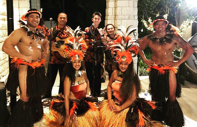 hula dancers and hawaiian musicians