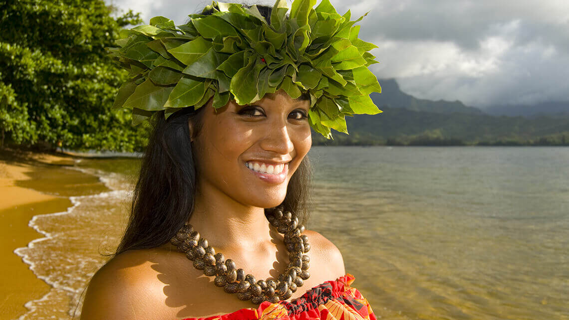 hawaiian girl with head lei on beach