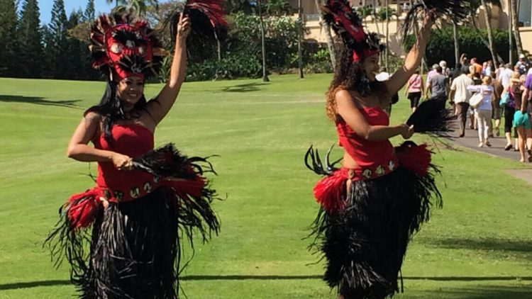 hula dancers performing outdoor